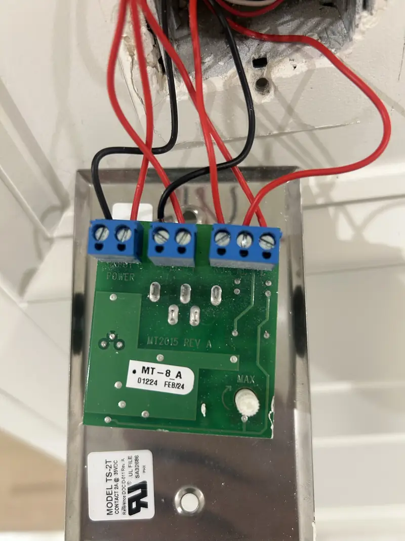 Wiring the back of a touch-sensor exit button