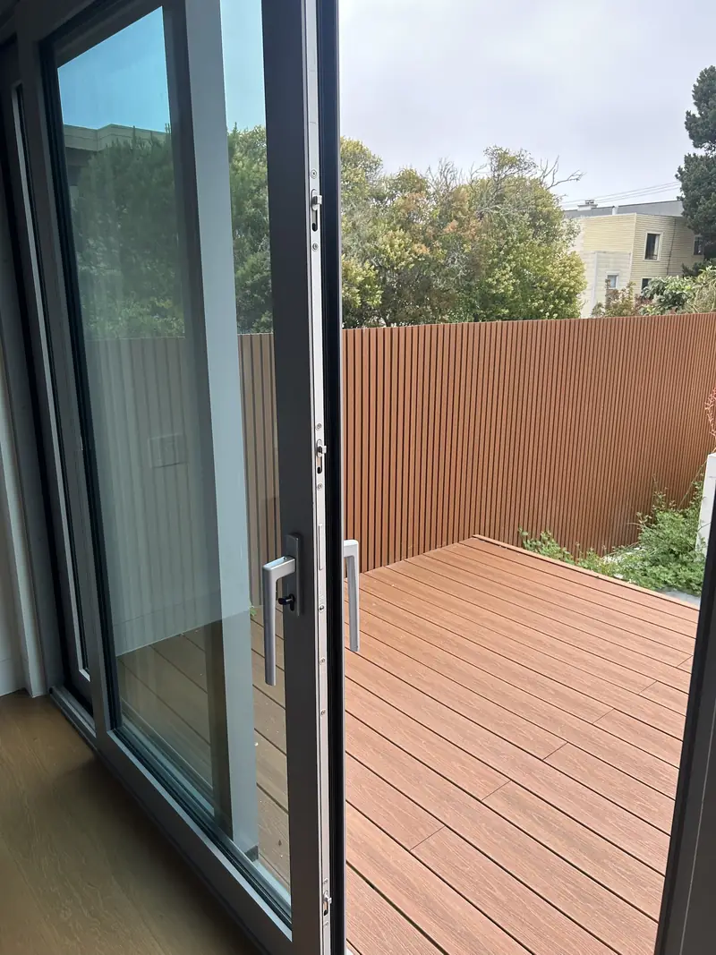 Sliding patio door with a multipoint lock handle